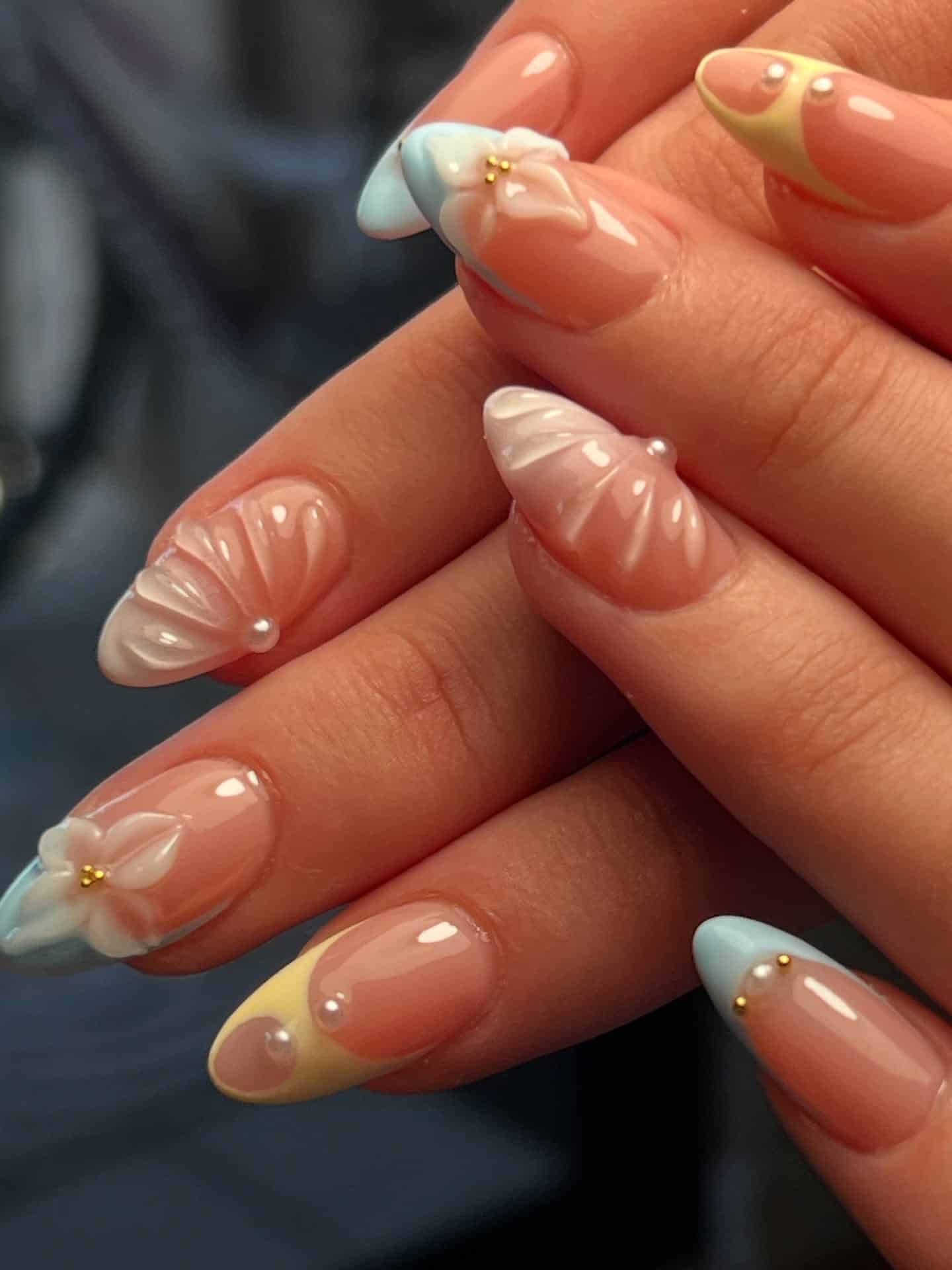22. Pastel Seashell Bloom - shell nail ideas