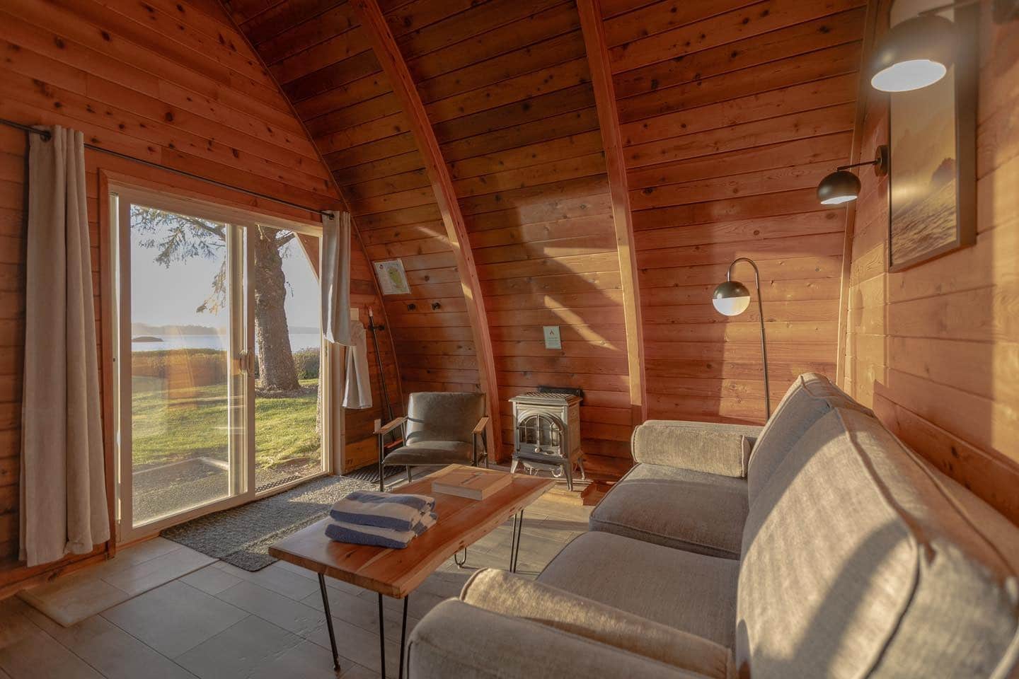 16. Compact Cabin with A-Frame Charm - cabin living room ideas