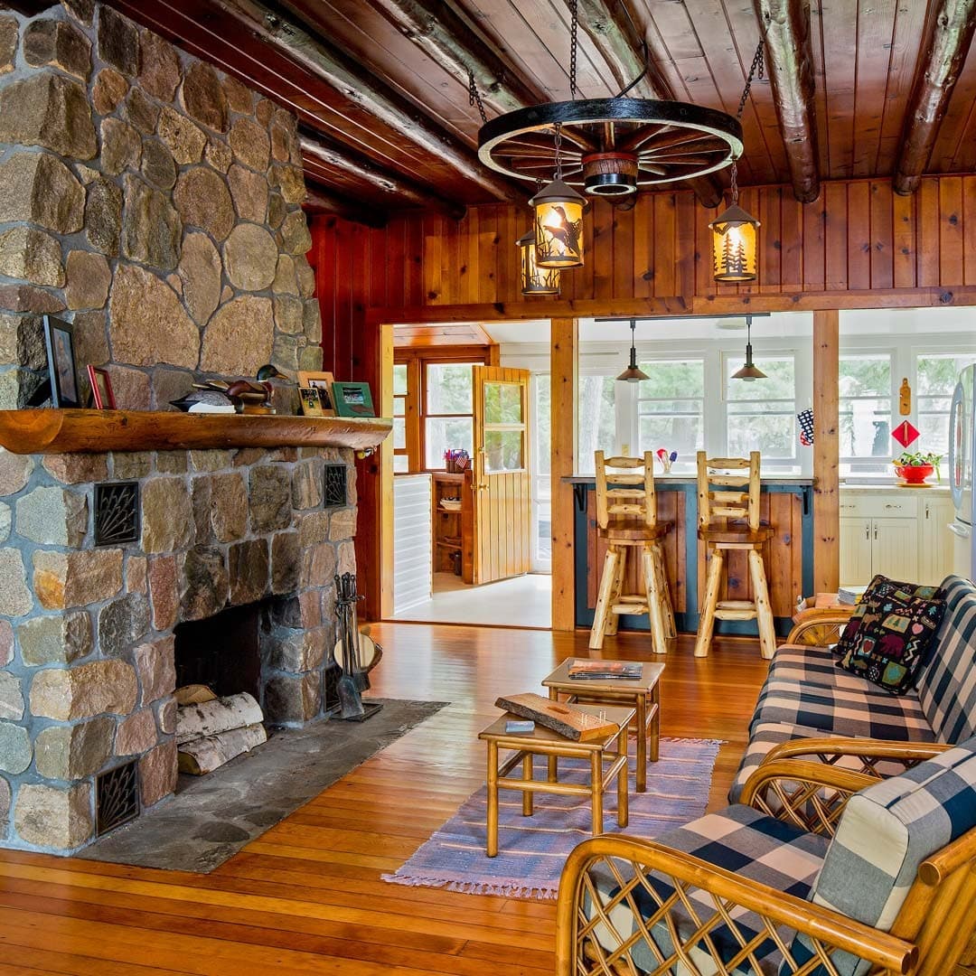 18. Vintage Cabin Style with Country Comfort - cabin living room ideas