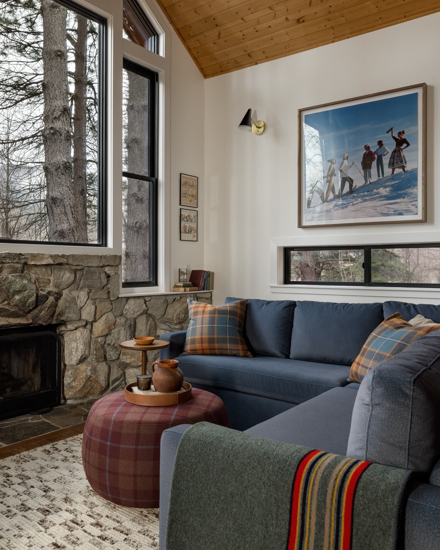 21. Cozy Cabin with Classic Plaids - cabin living room ideas