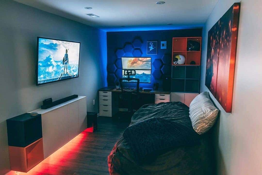 5. Dual-Screen Retreat with Ambient Lighting - gaming bedroom ideas