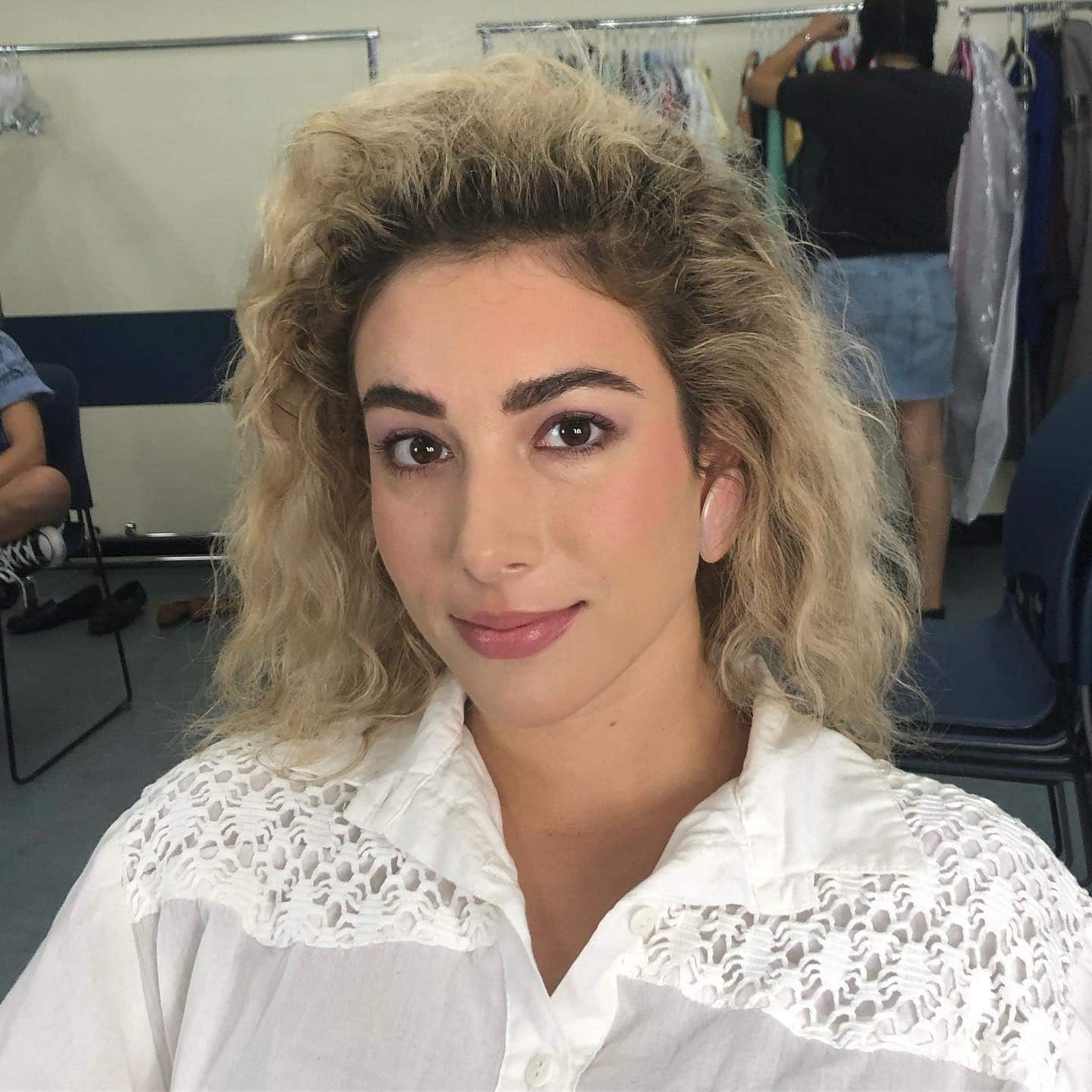 6. Soft Permed Blonde - 80S Hairstyles