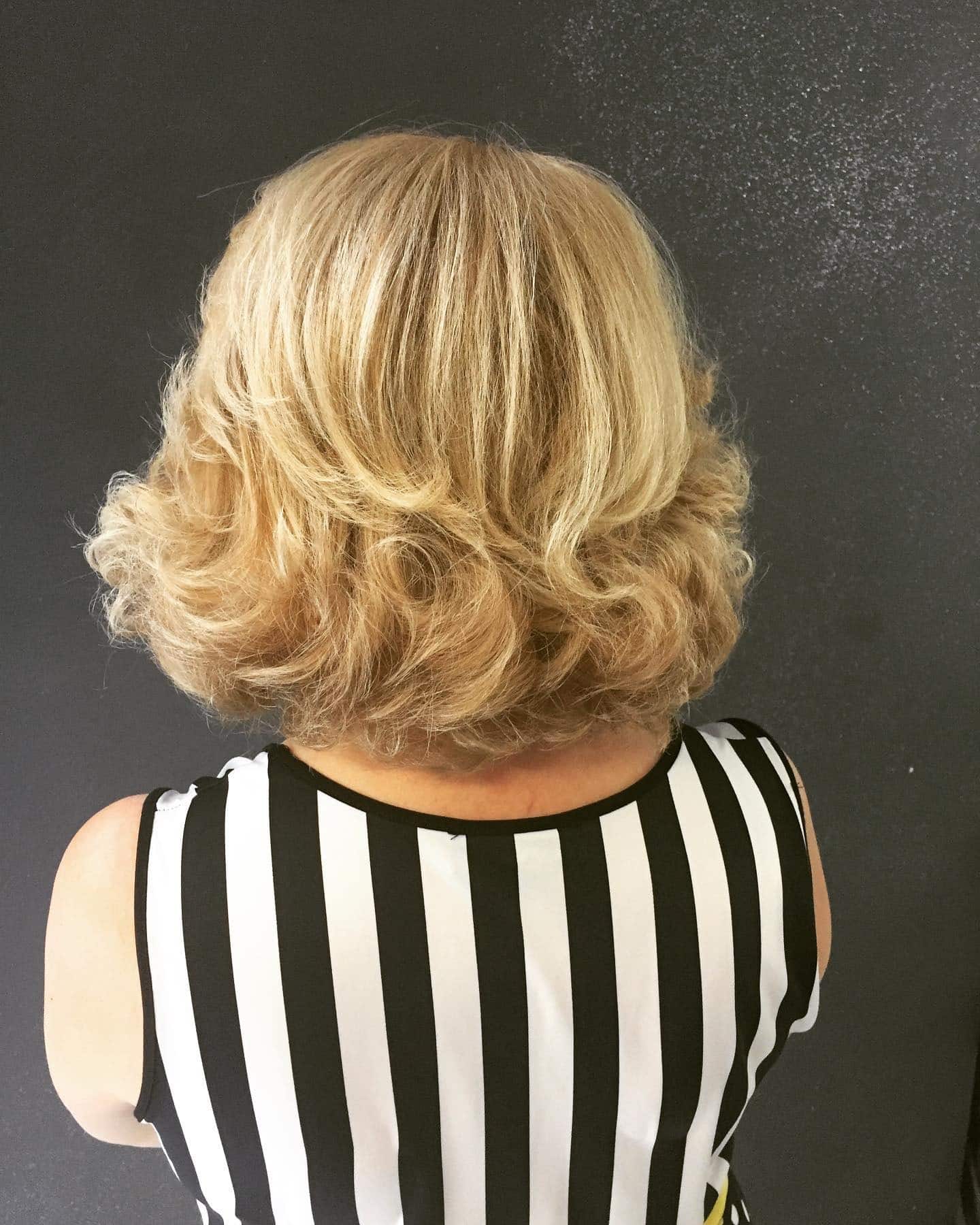 12. Golden Feathered Bob - 80S Hairstyles