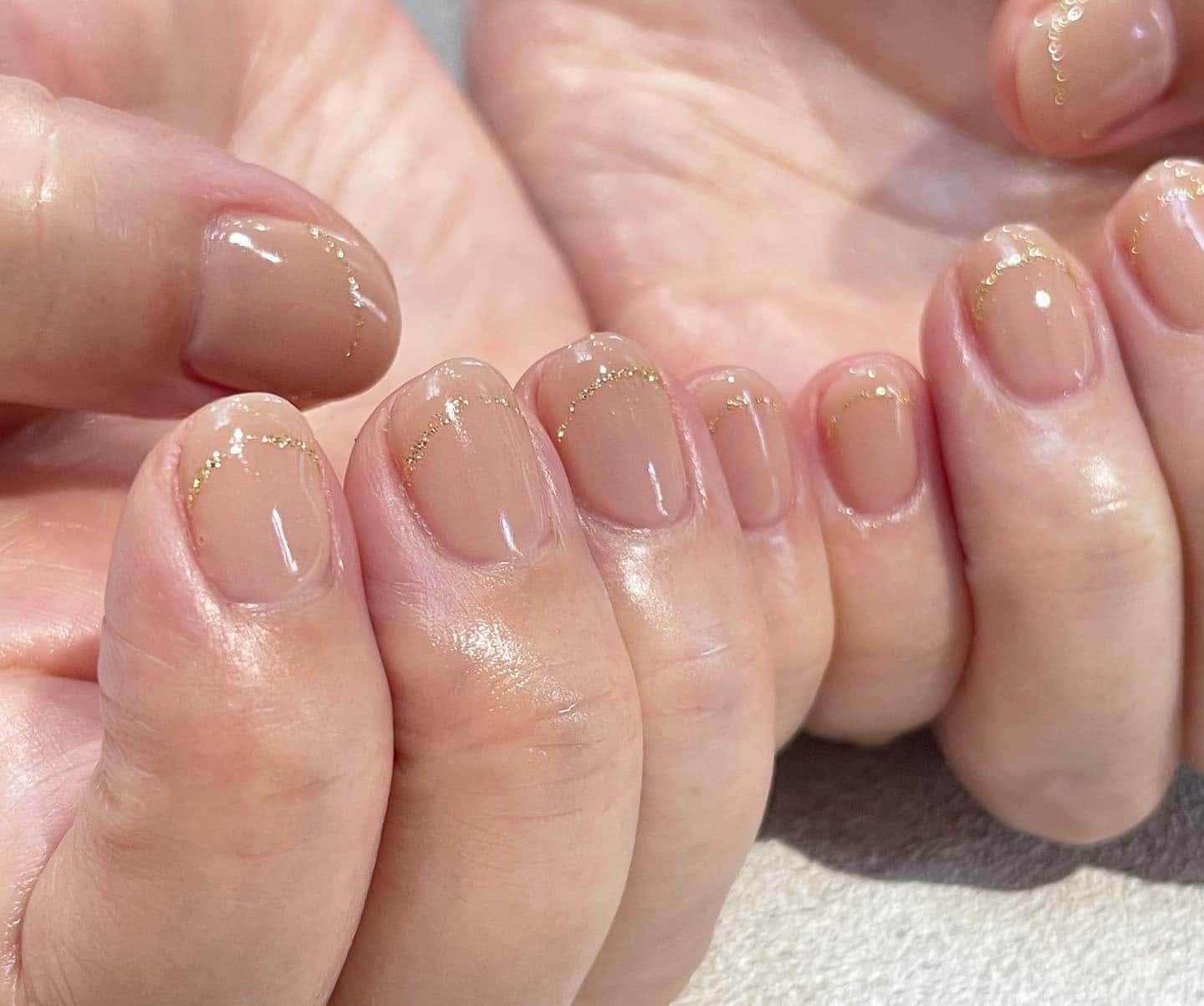 9. Nude Nails with Subtle Gold Accent - shellac nail ideas