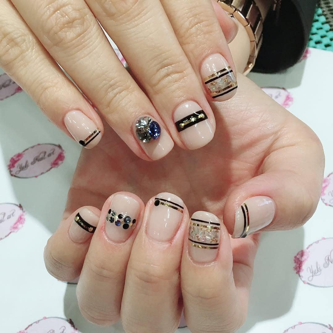 19. Striped Nude Nails with Jewel Embellishments - shellac nail ideas