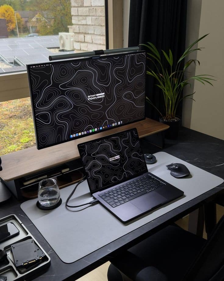 6. Minimalist Dual-Screen Setup - grey desk office ideas