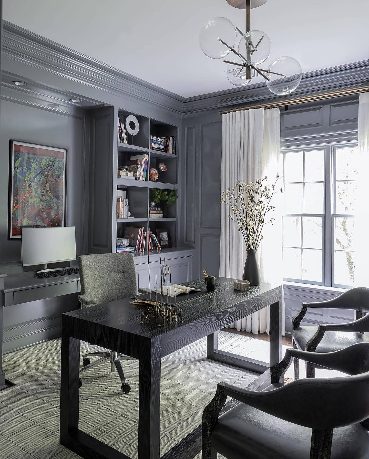 11. Charcoal Elegance with Paneled Walls - grey desk office ideas