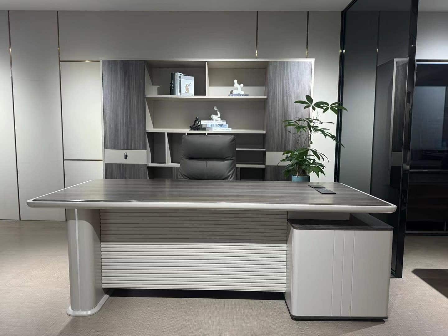 14. Executive Grey Office with Built-In Storage - grey desk office ideas