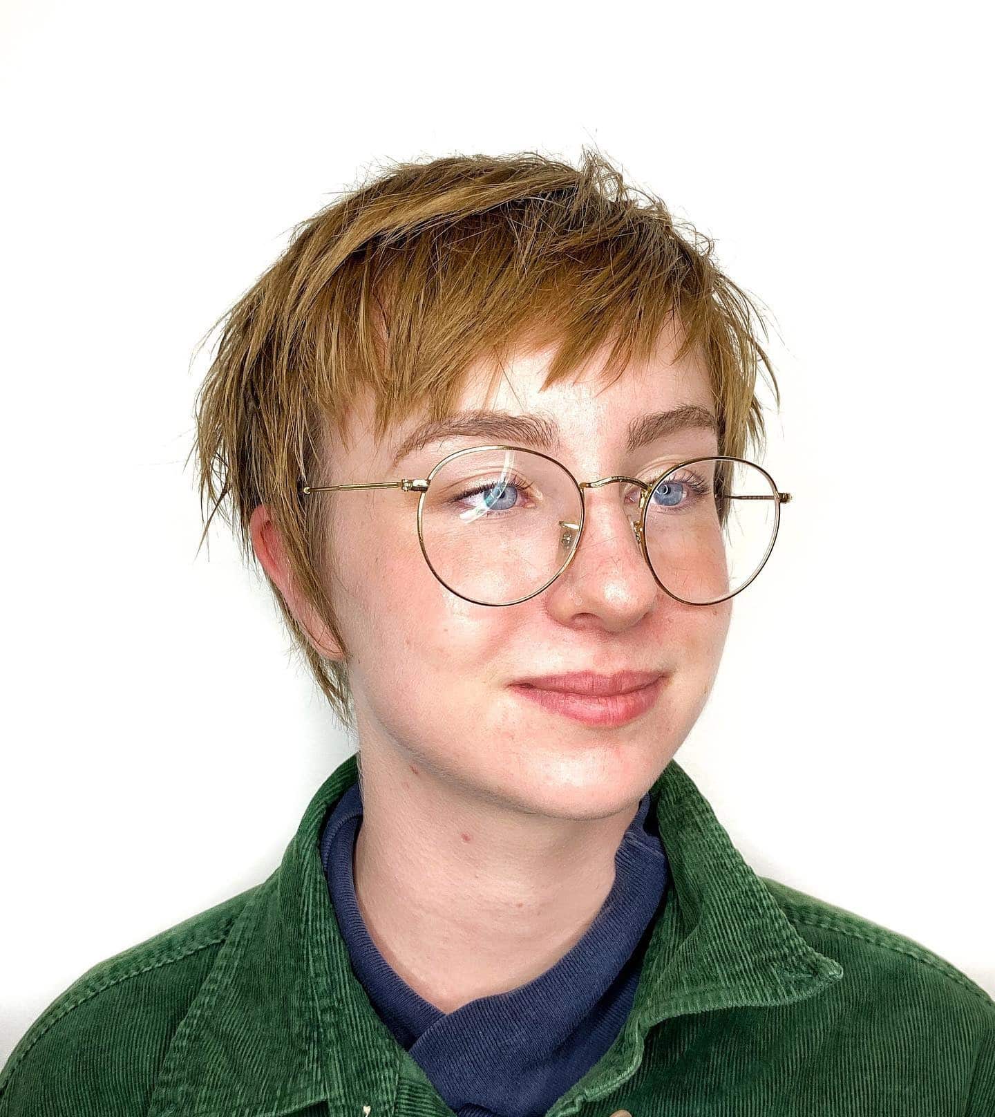 14. Golden Choppy Pixie with Glasses - Choppy Pixie Haircuts