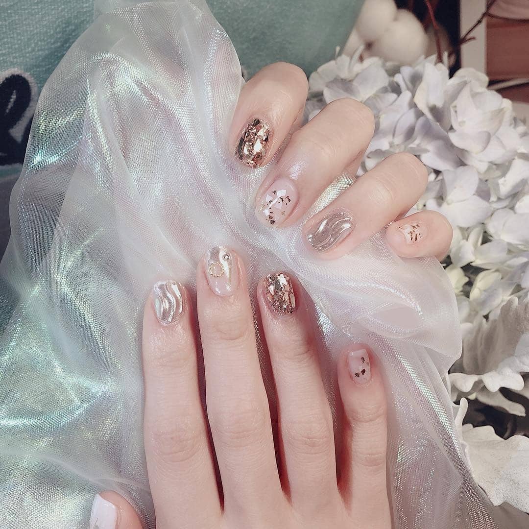 1. Metallic Foil Elegance - shiny nail ideas