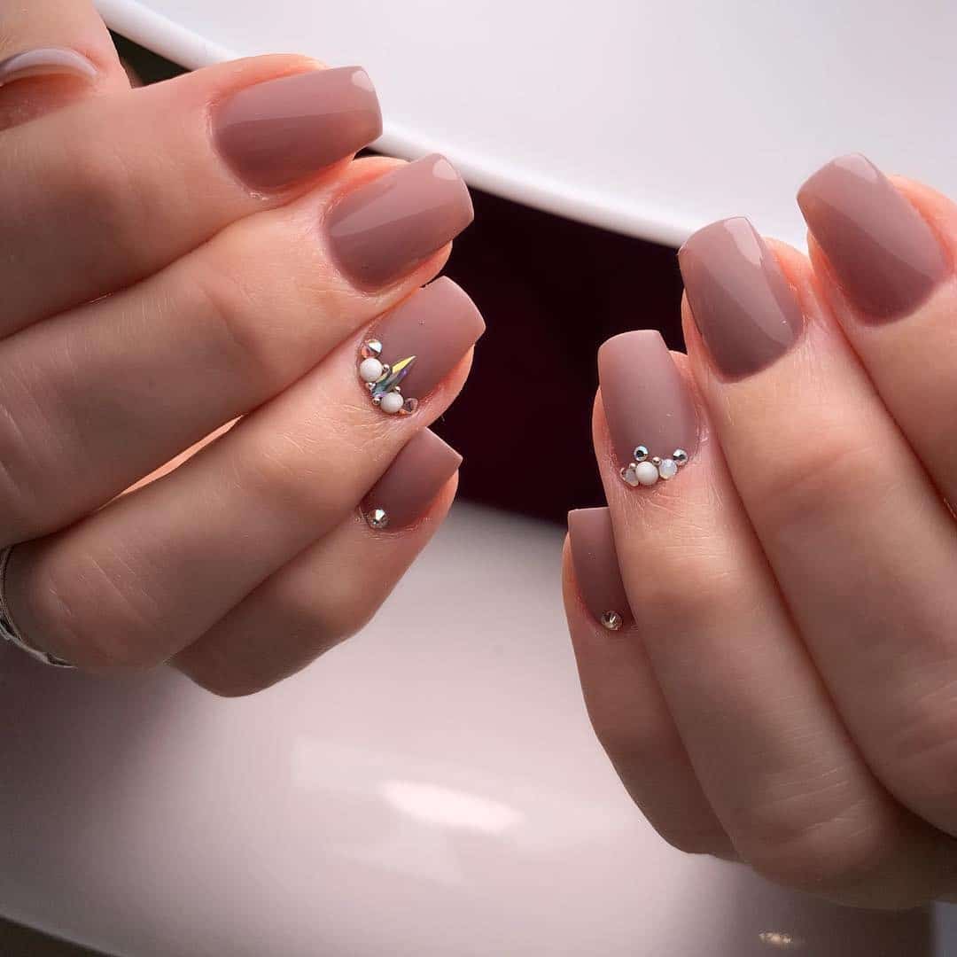 4. Rose Mauve with Gem Accents - shiny nail ideas