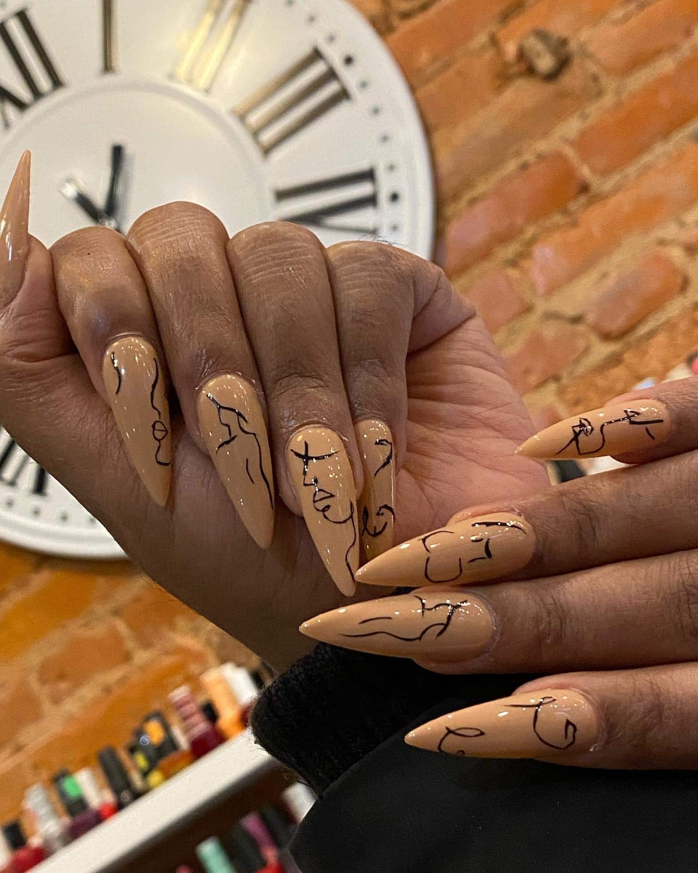 14. Abstract Nude Line Art - shiny nail ideas