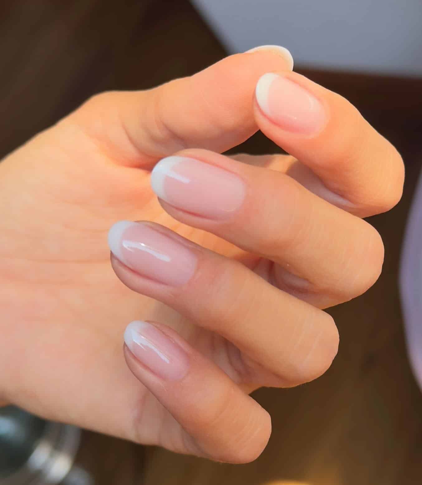 1. Soft Almond French with Sheer Pink - short french nail ideas