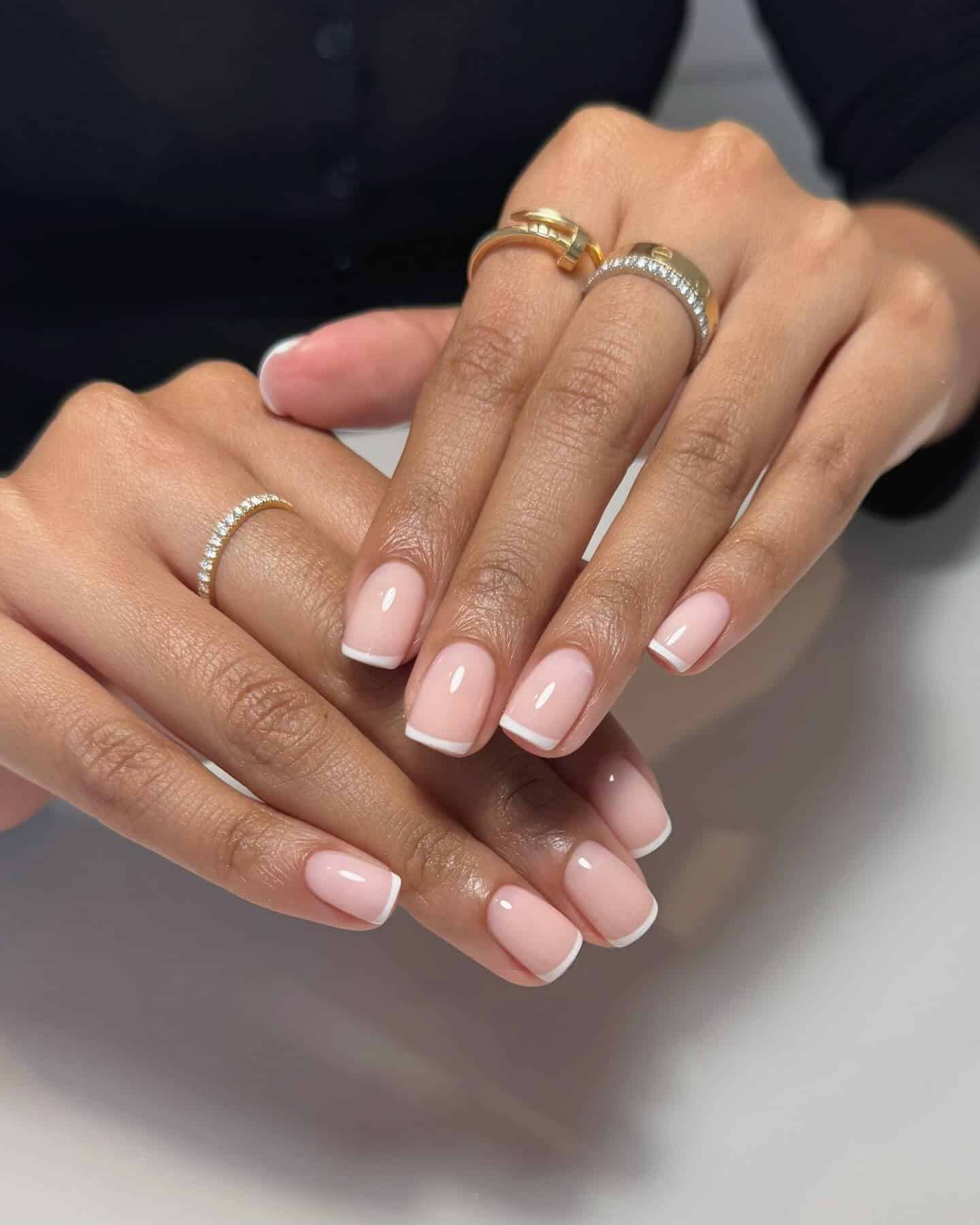 5. Glossy Short French with Subtle Shine - short french nail ideas