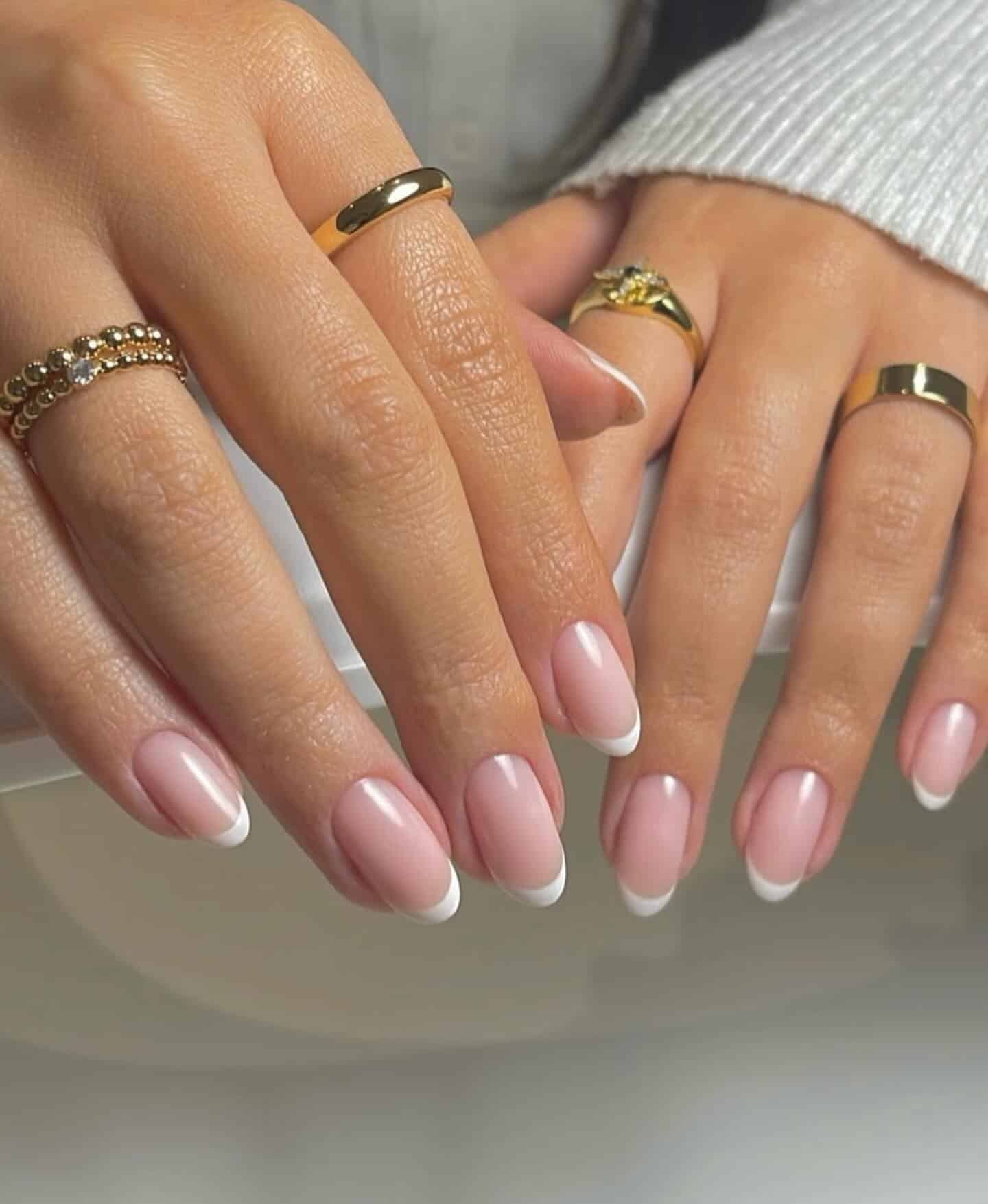 6. Oval French Elegance - short french nail ideas