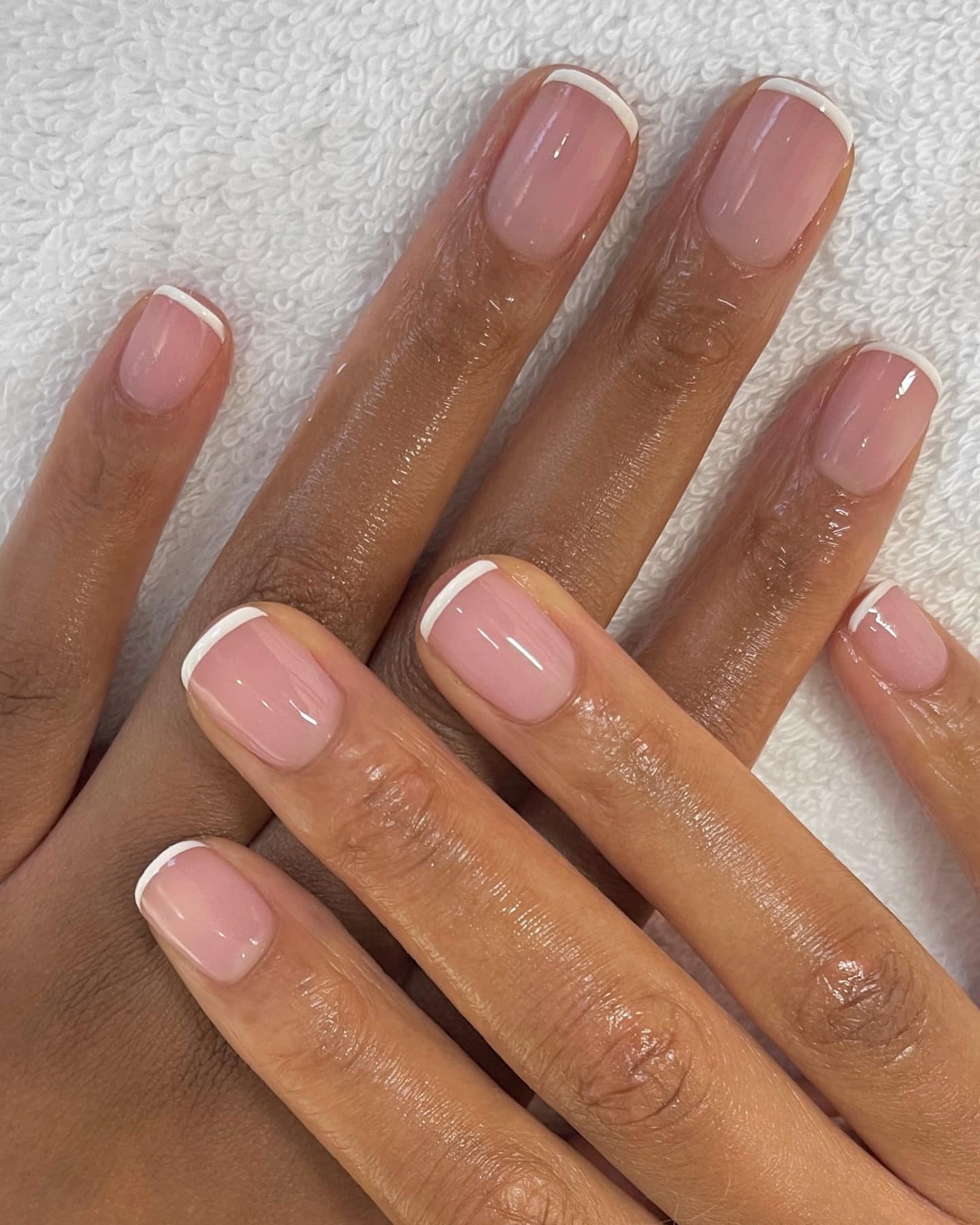 14. Glossy Short French - short french nail ideas