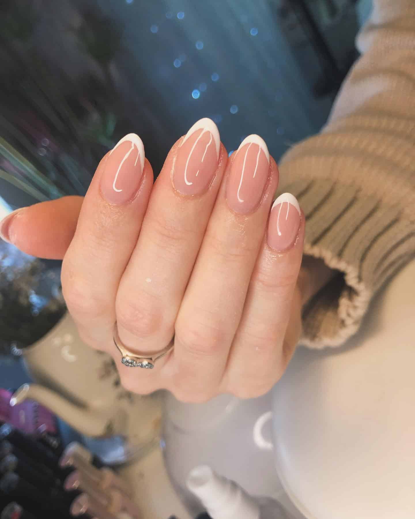 18. Sleek Oval French - short french nail ideas