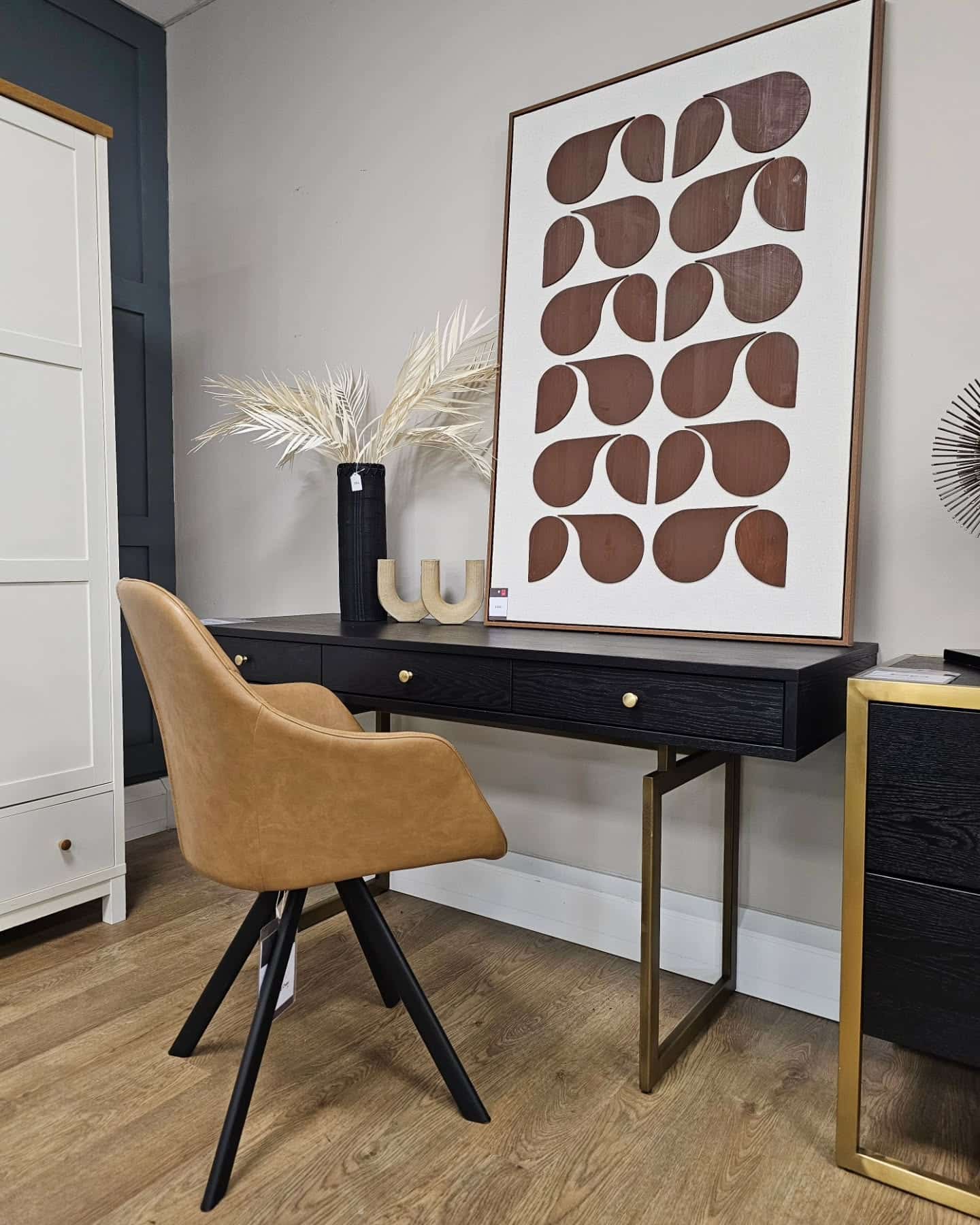 21. Modern Contrast with Warm Accents - black desk office ideas
