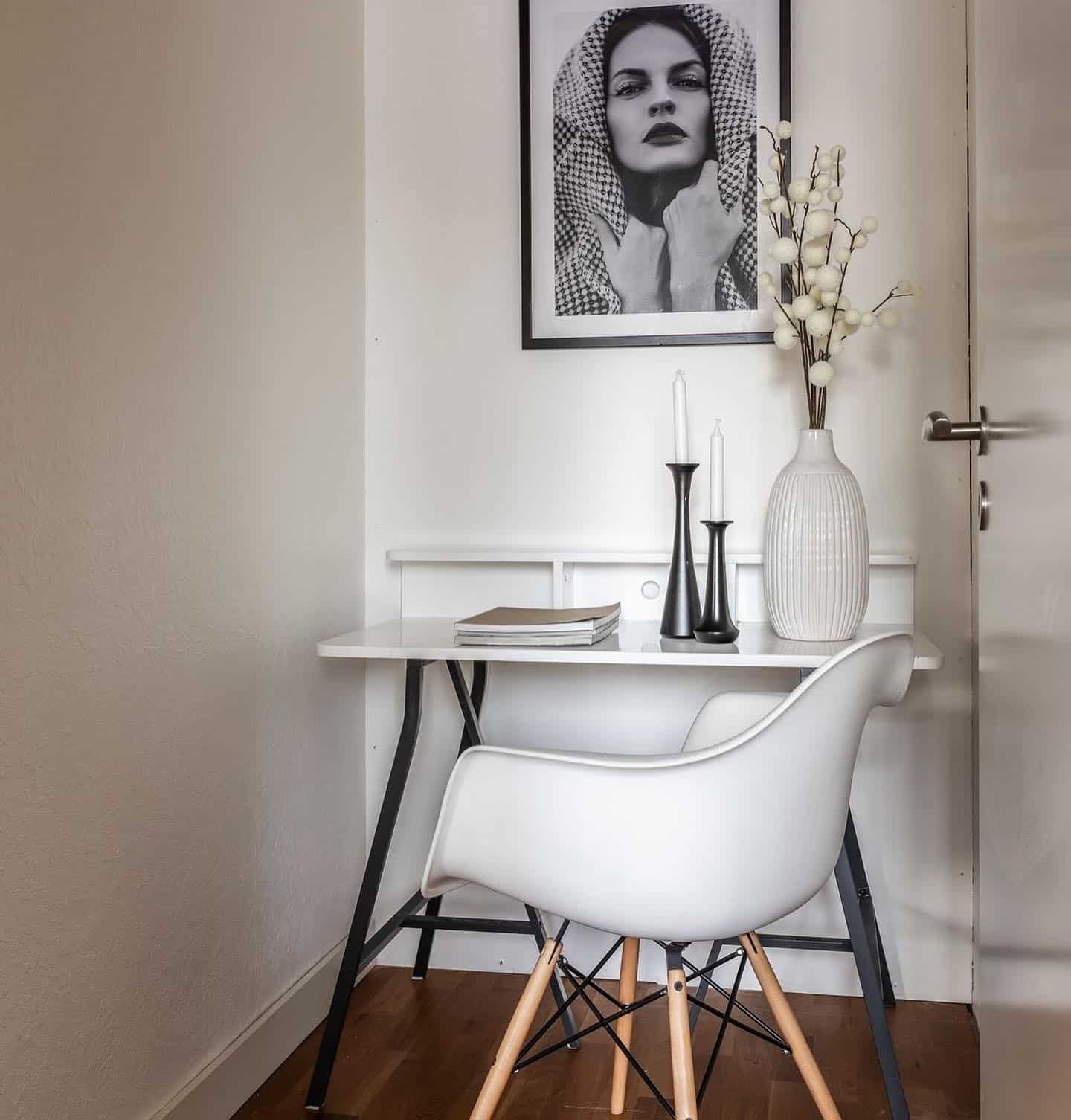 4. Monochrome Elegance with Black Accents - tiny home office ideas