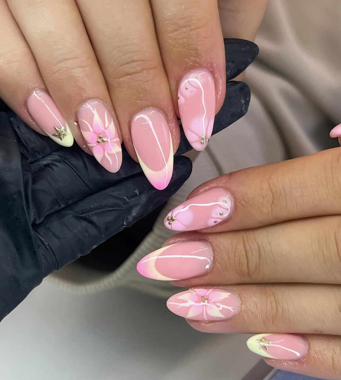 1. Almond Blossom Pink with Floral Accents - short pink nail ideas
