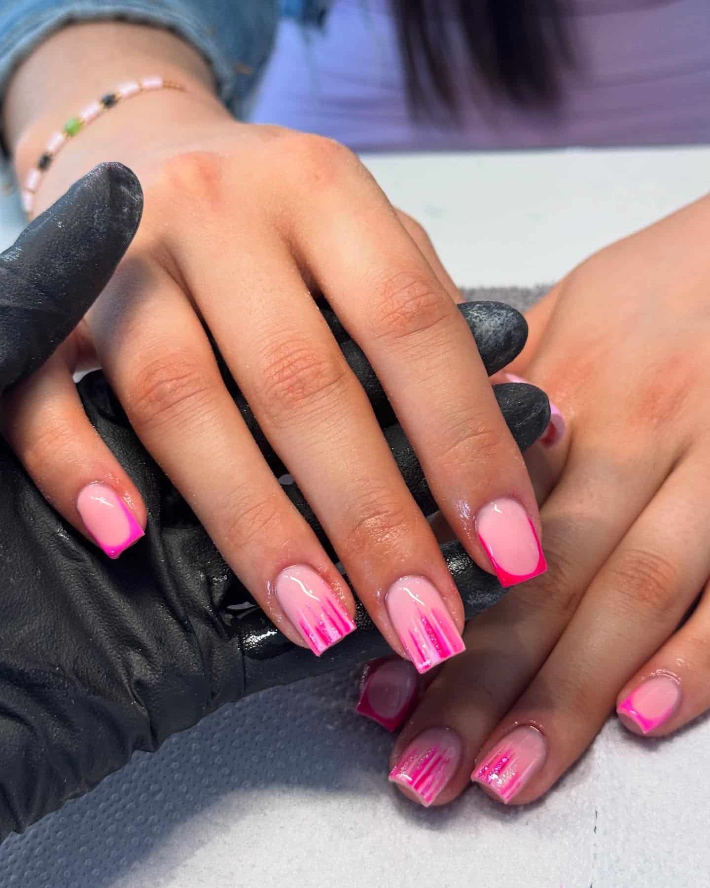 4. Modern Ombre Pink Squares with Brushstroke Tips - short pink nail ideas