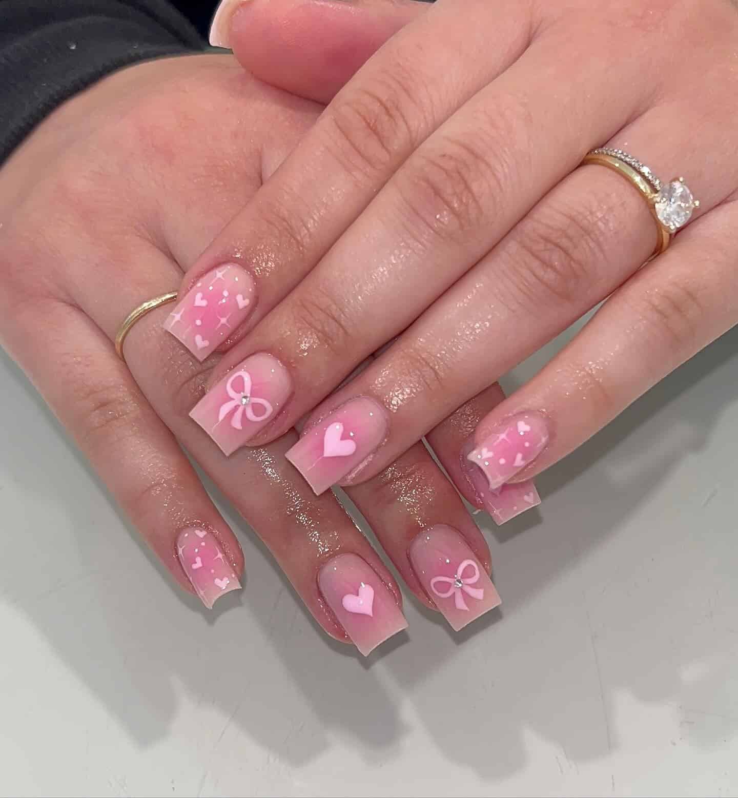 15. Square Pink with Hearts and Bows - short pink nail ideas
