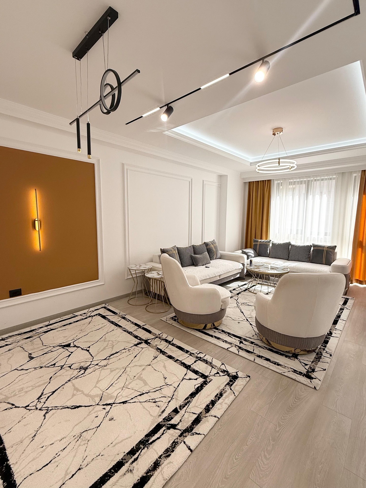 1. Modern Luxe with Geometric Drama - urban living room ideas