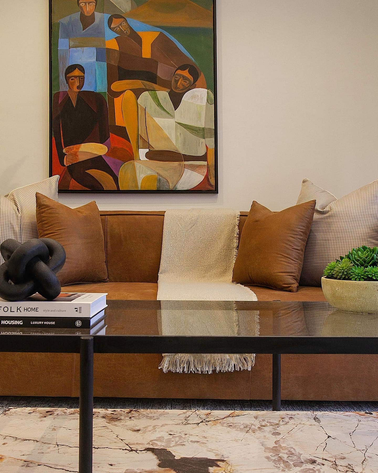 14. Artistic Warmth with Earthy Tones - urban living room ideas