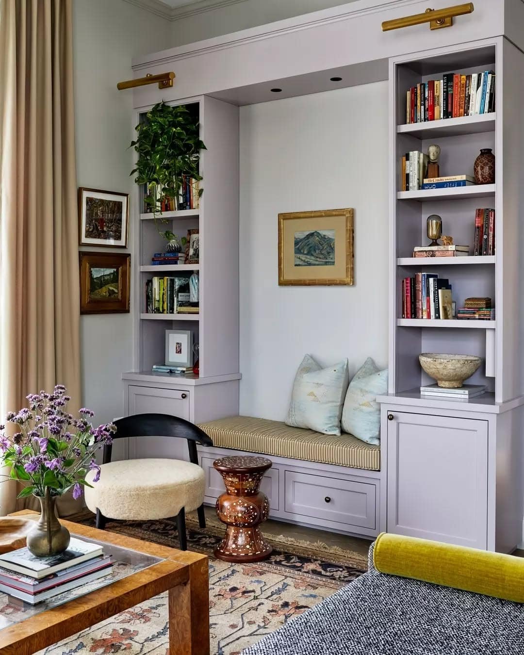 18. Cozy Reading Nook with Pastel Charm - urban living room ideas