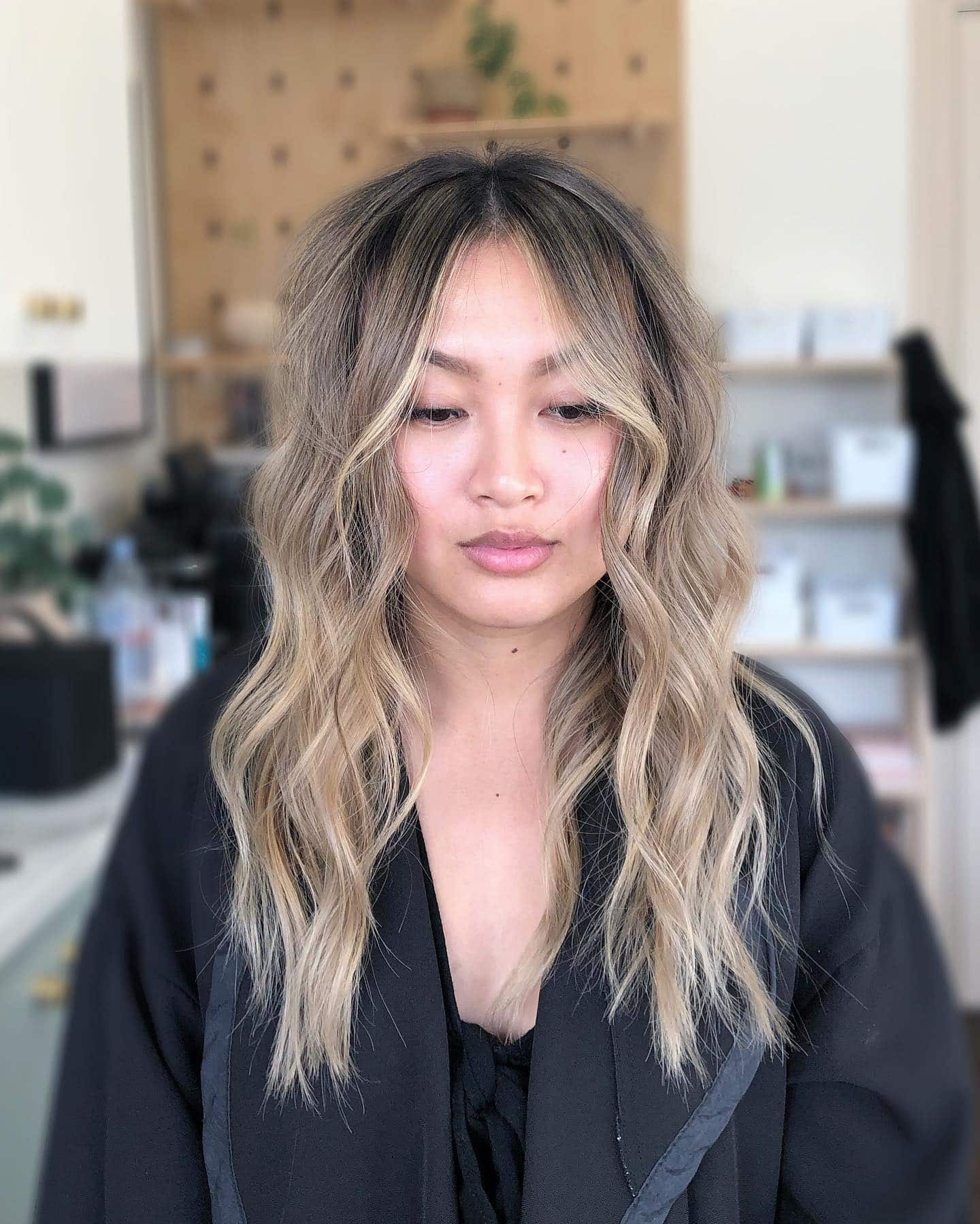 21. Wavy Milk Tea Blonde with Face-Framing Layers - Milk Tea Hair Color