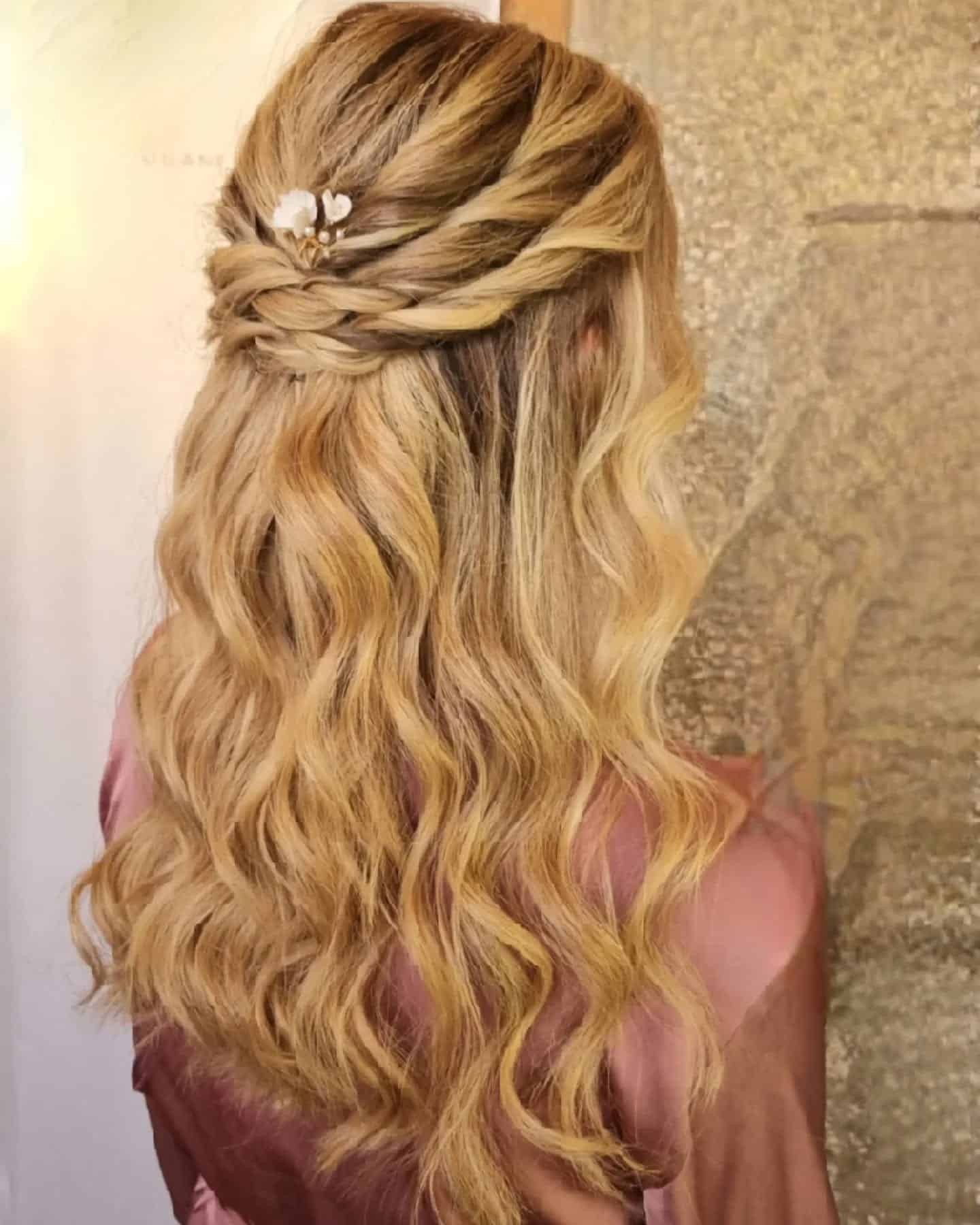 16. Golden Half-Up Waves with Floral Accent - Wavy Hairstyles