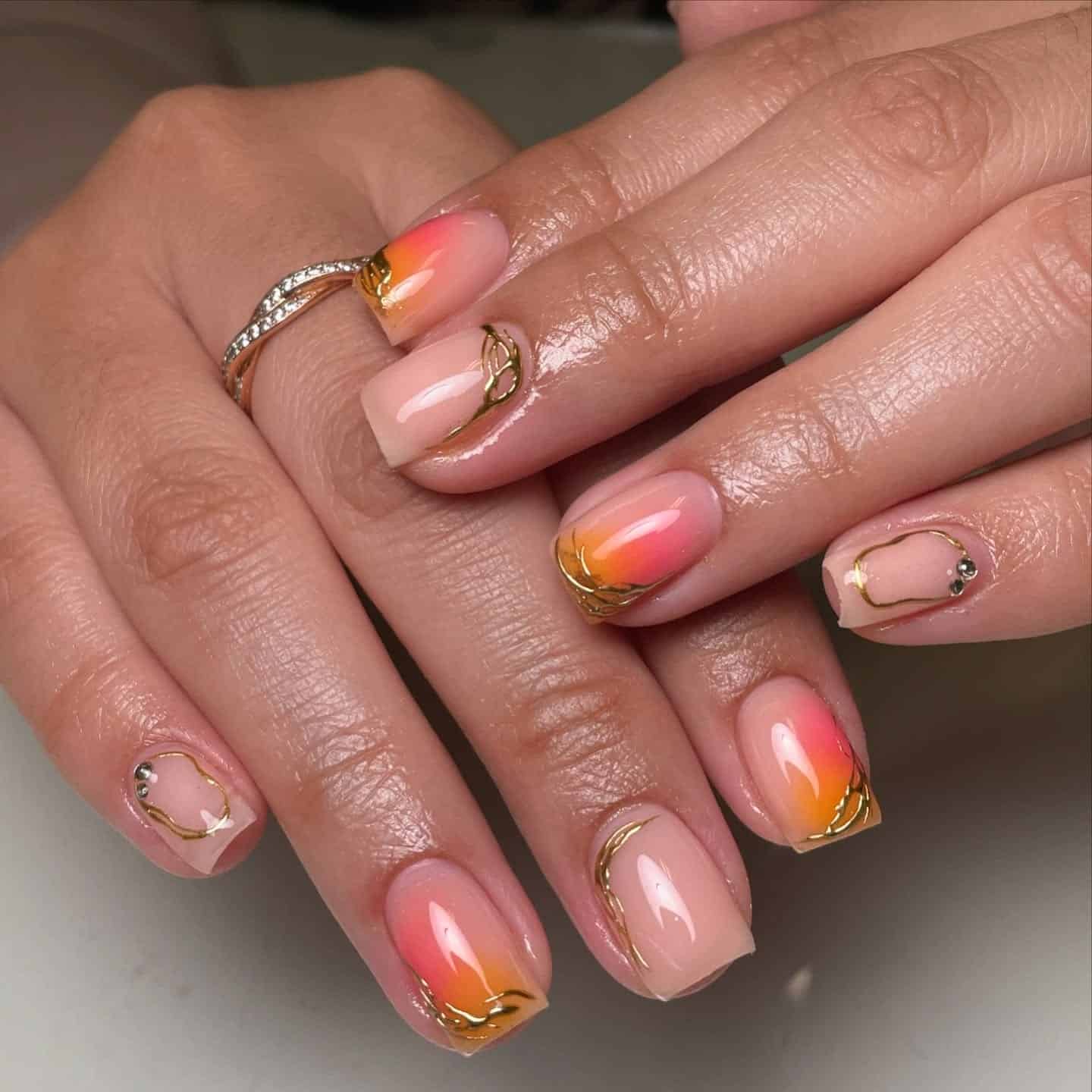 4. Sunset Ombre with Gold Detailing - simple short square nail ideas