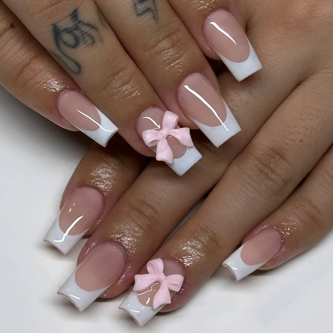 5. Bold French with 3D Bows - simple short square nail ideas