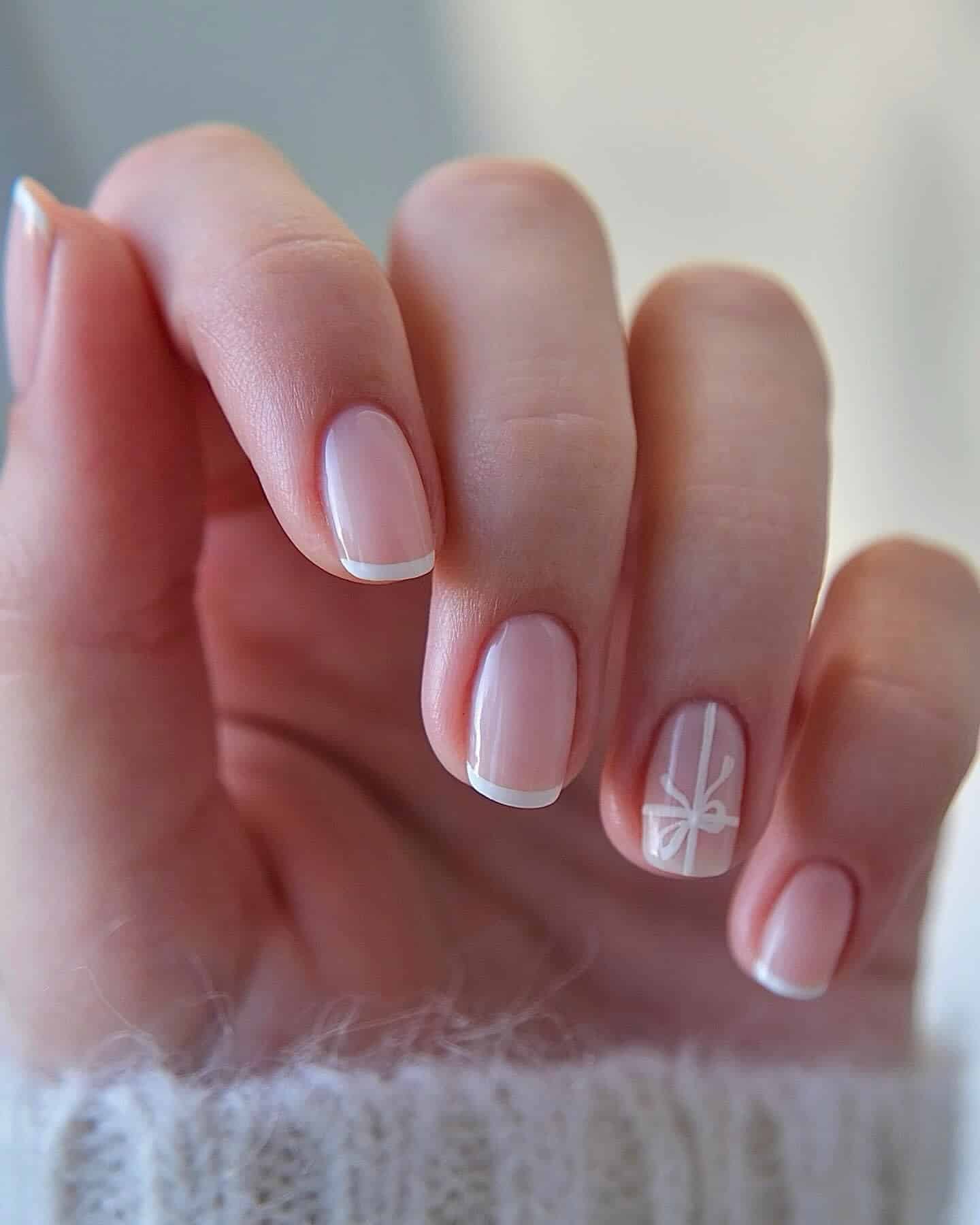 18. French with White Bow Accent - simple short square nail ideas