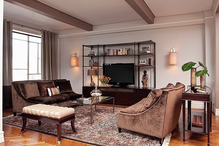 1. Classic Masculine Elegance with Rich Browns - masculine living room ideas