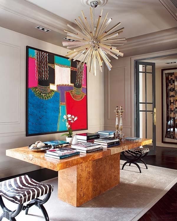 6. Eclectic Masculine Energy with Bold Art - masculine living room ideas