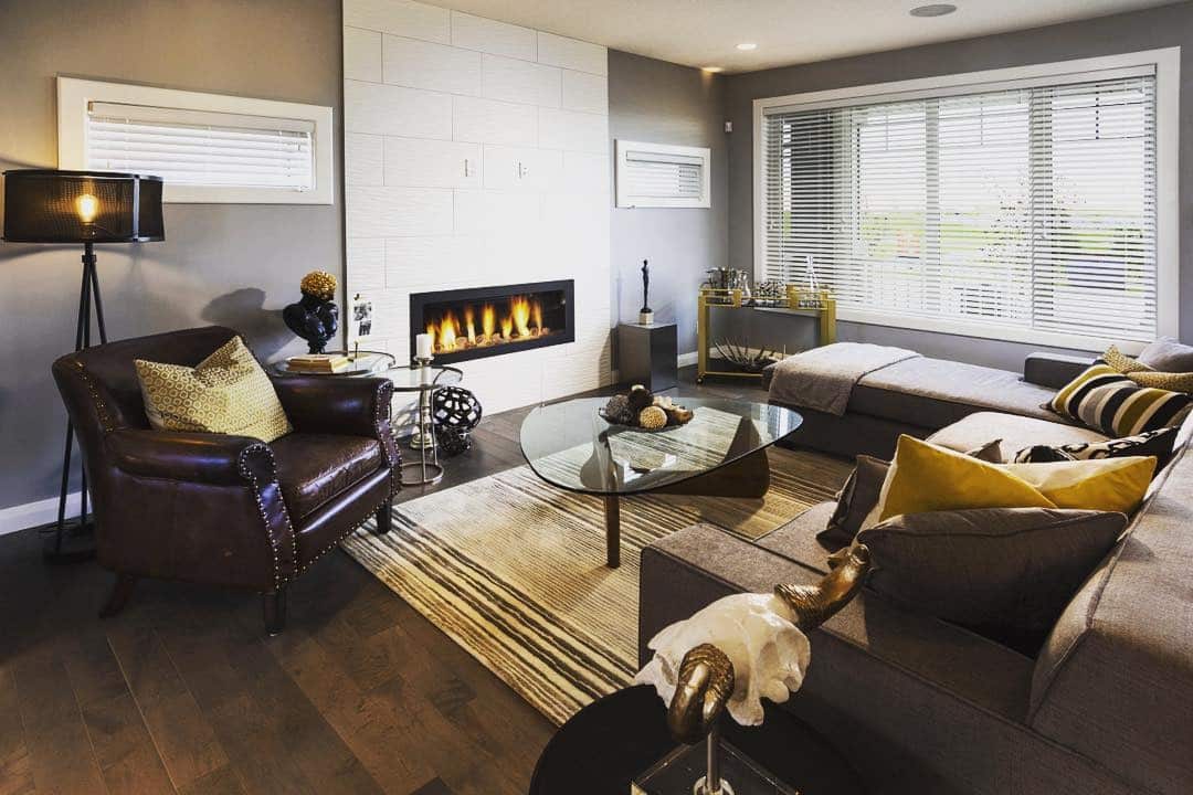 7. Modern Warmth with Masculine Accents - masculine living room ideas