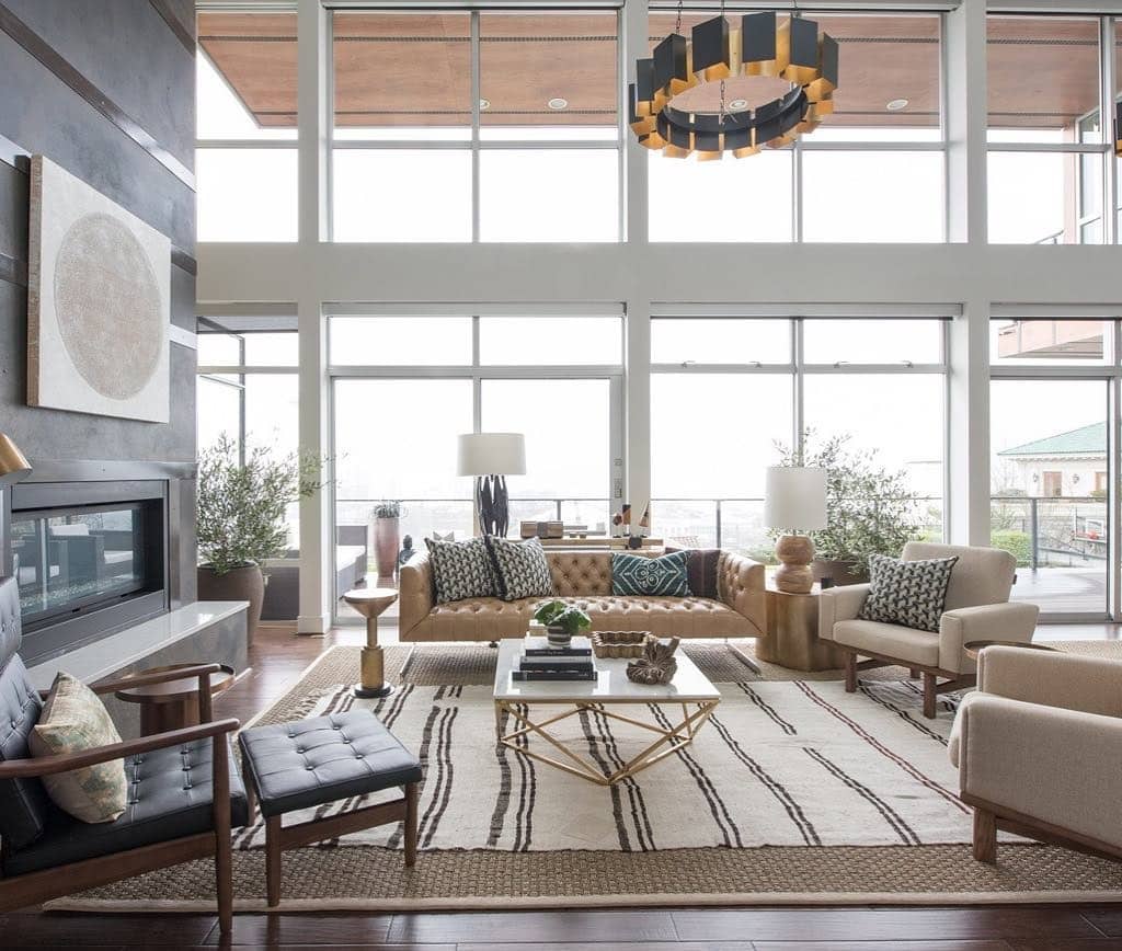 11. Modern Luxe with Natural Light and Leather - masculine living room ideas