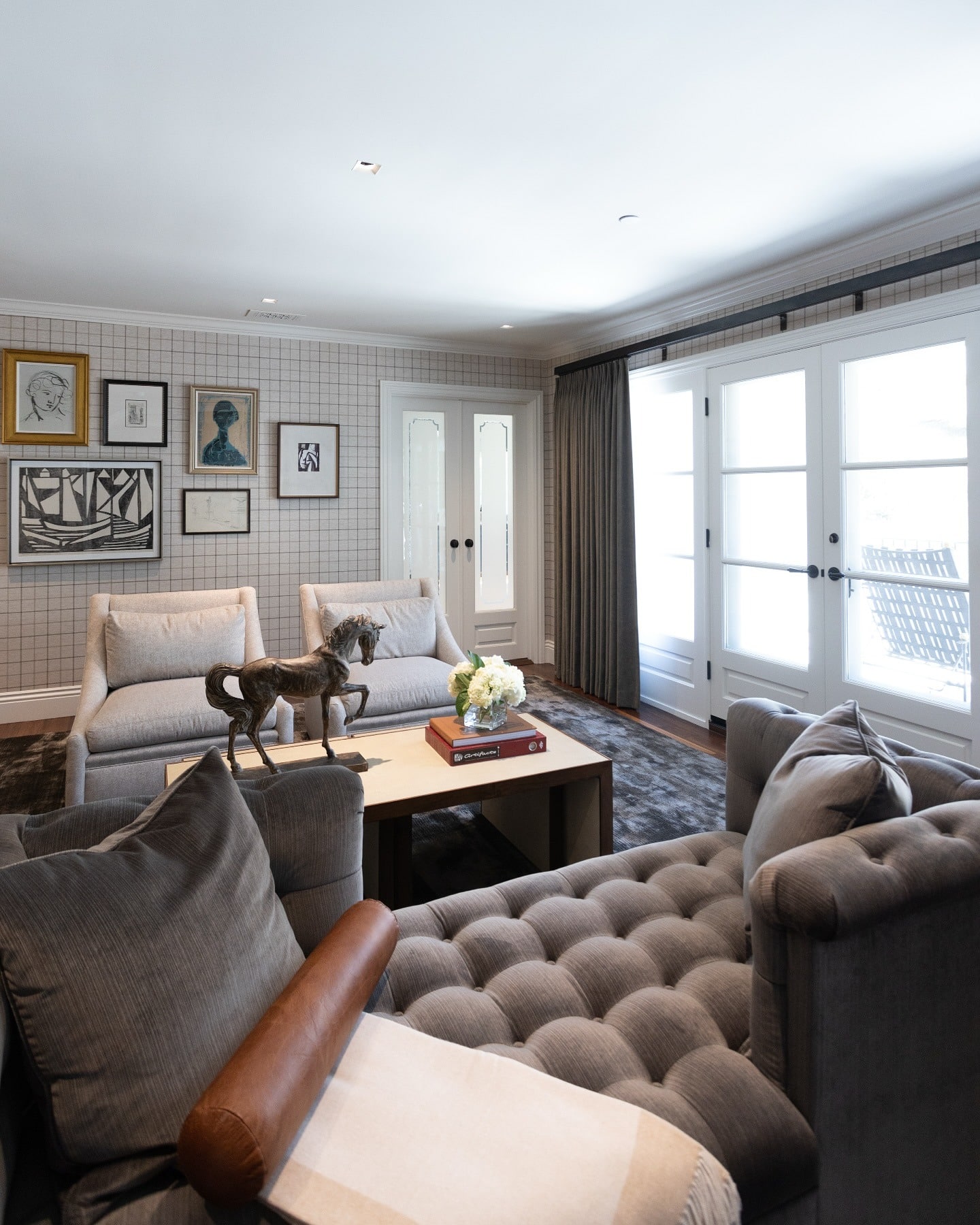 17. Tailored Comfort with Subtle Pattern Play - masculine living room ideas