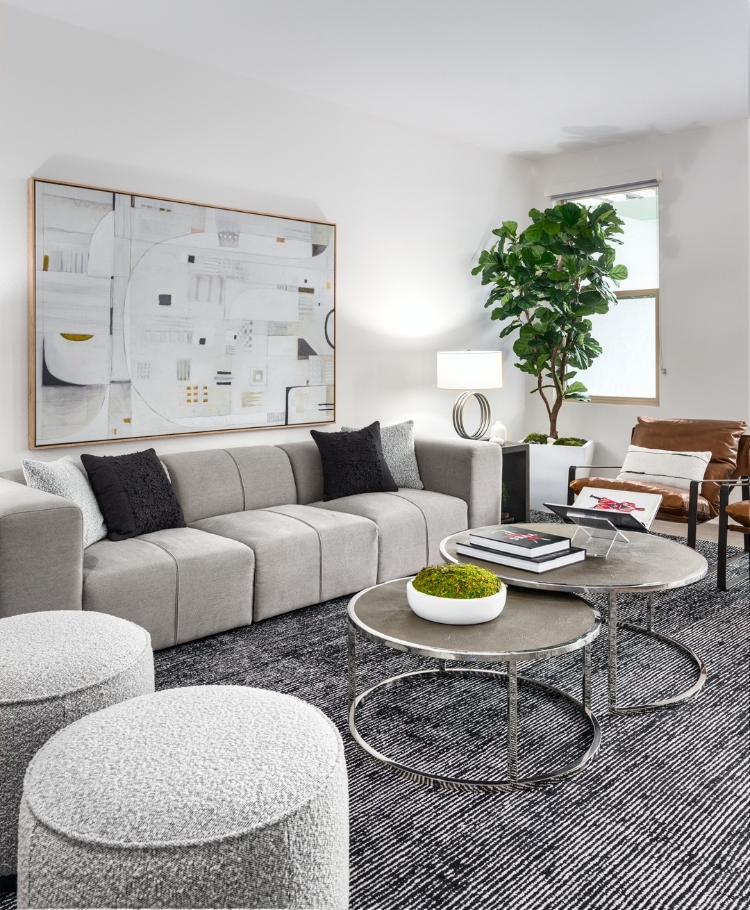 19. Streamlined Neutrals with Graphic Touches - masculine living room ideas