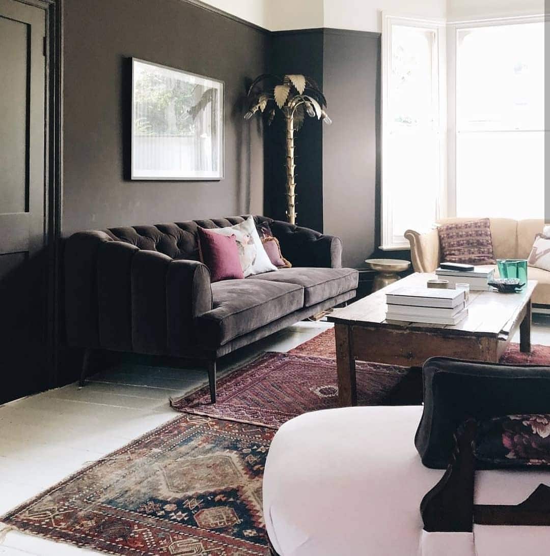 4. Eclectic Vintage Elegance - brown and black living room ideas