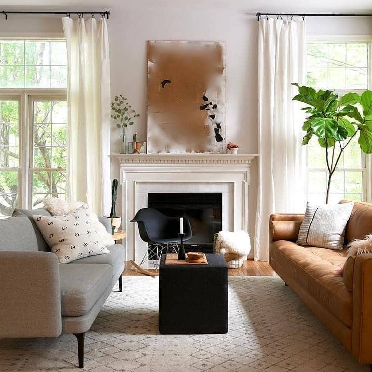 8. Bright Contrast with Natural Light - brown and black living room ideas