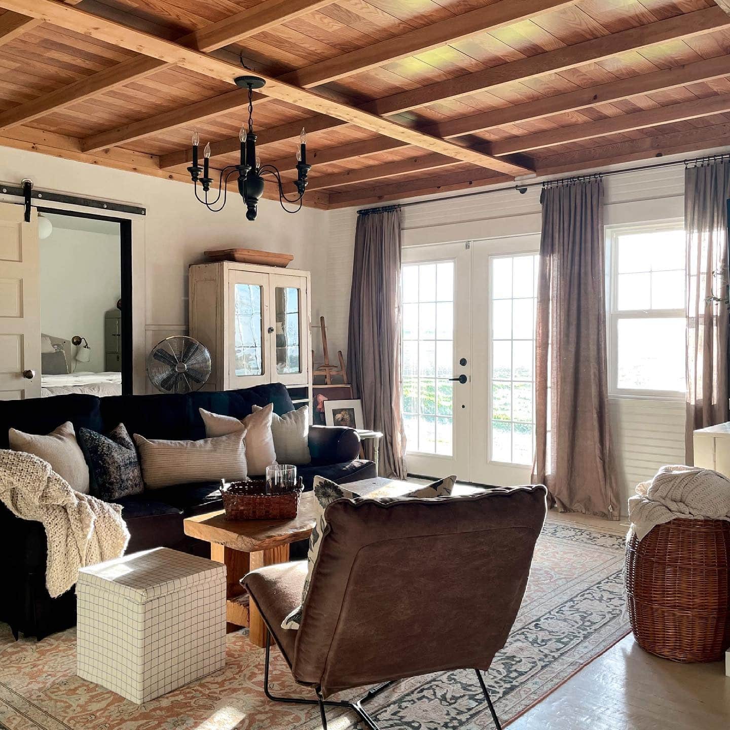 13. Rustic Comfort with Dark Seating - brown and black living room ideas