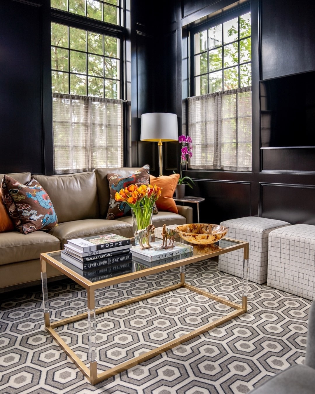 14. Pattern Play with Glossy Black Walls - brown and black living room ideas