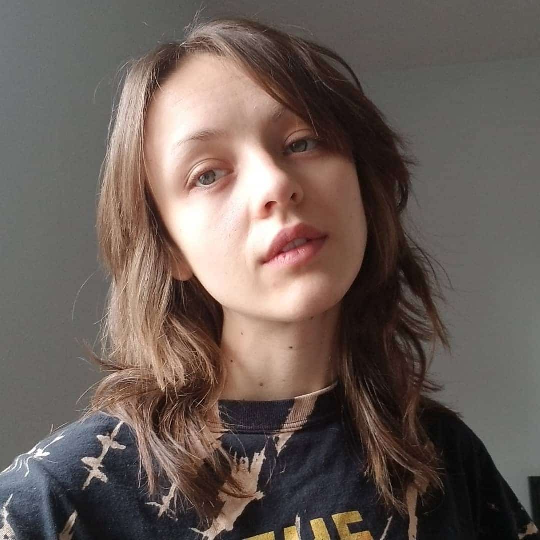 1. Tousled Shag with Natural Brunette - 70S Hairstyles