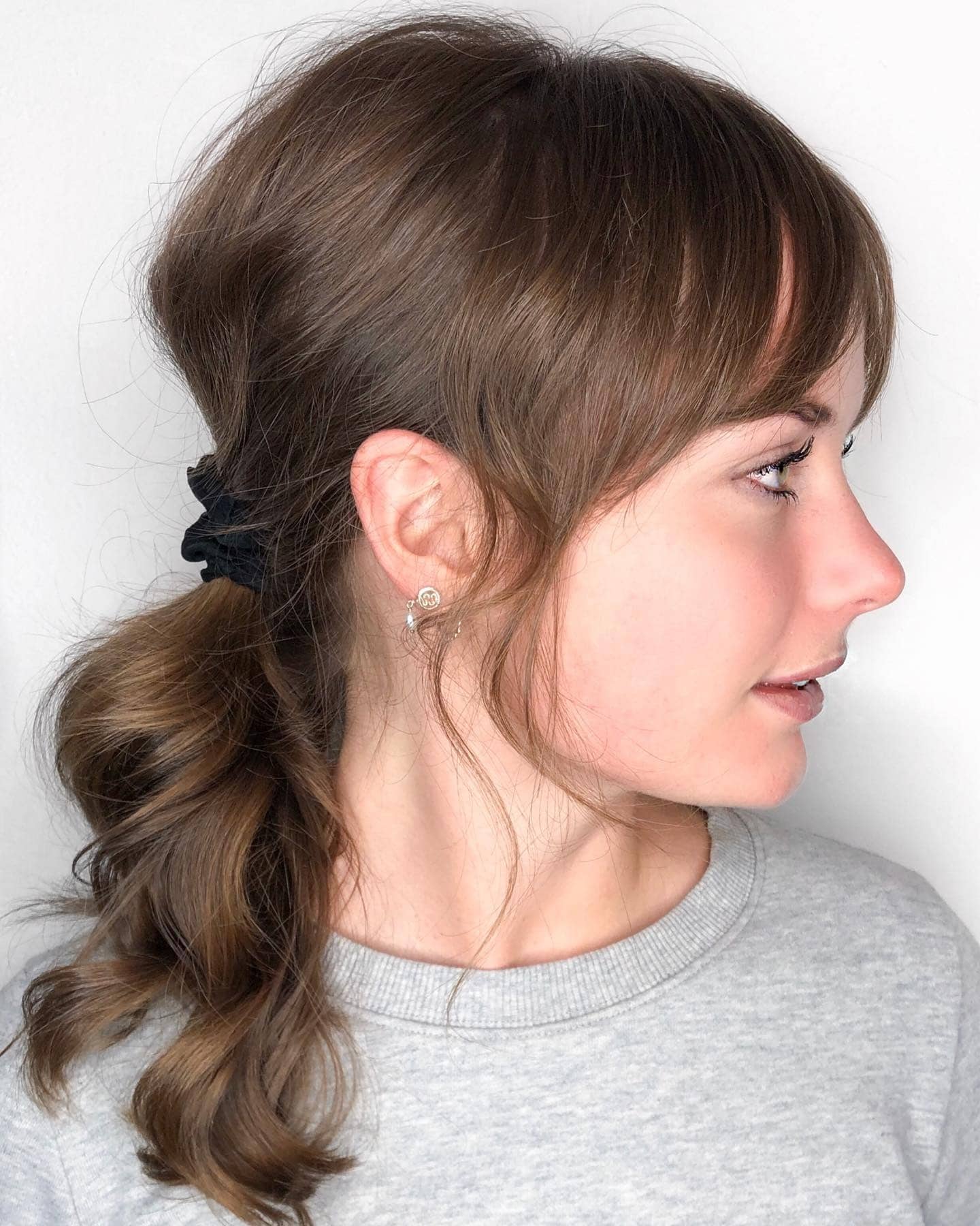7. Ponytail with Wispy Bangs - 70S Hairstyles