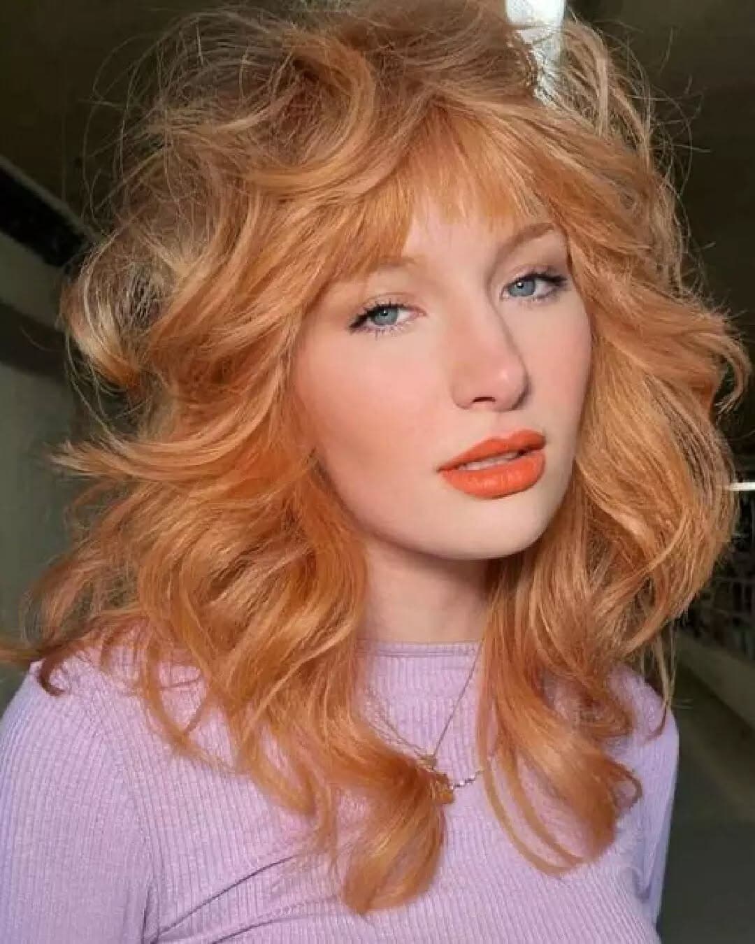 8. Feathered Copper Layers with Bangs - 70S Hairstyles