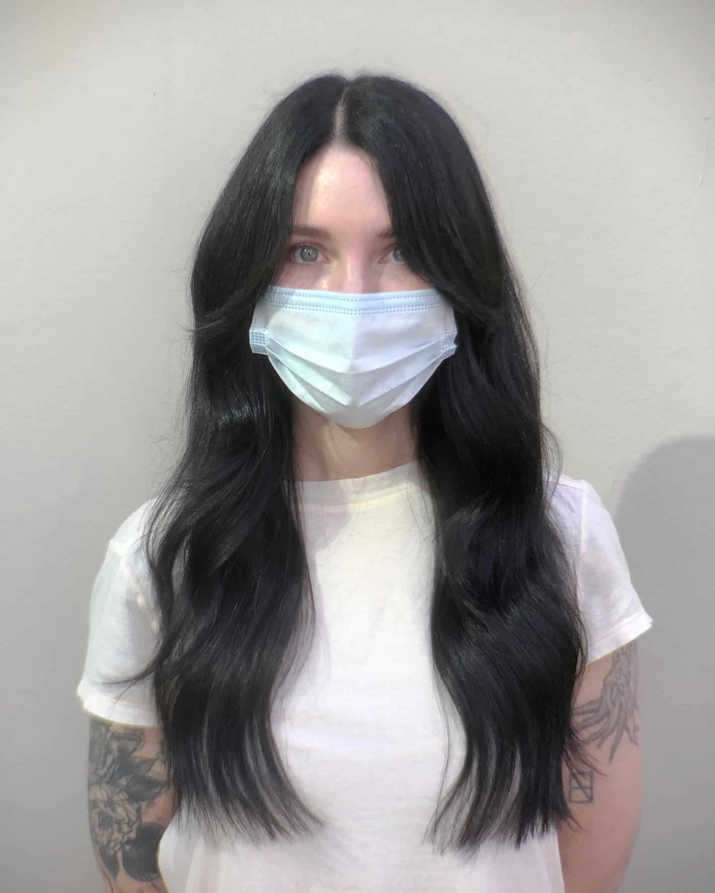 9. Glossy Jet Black with Long Waves - 70S Hairstyles