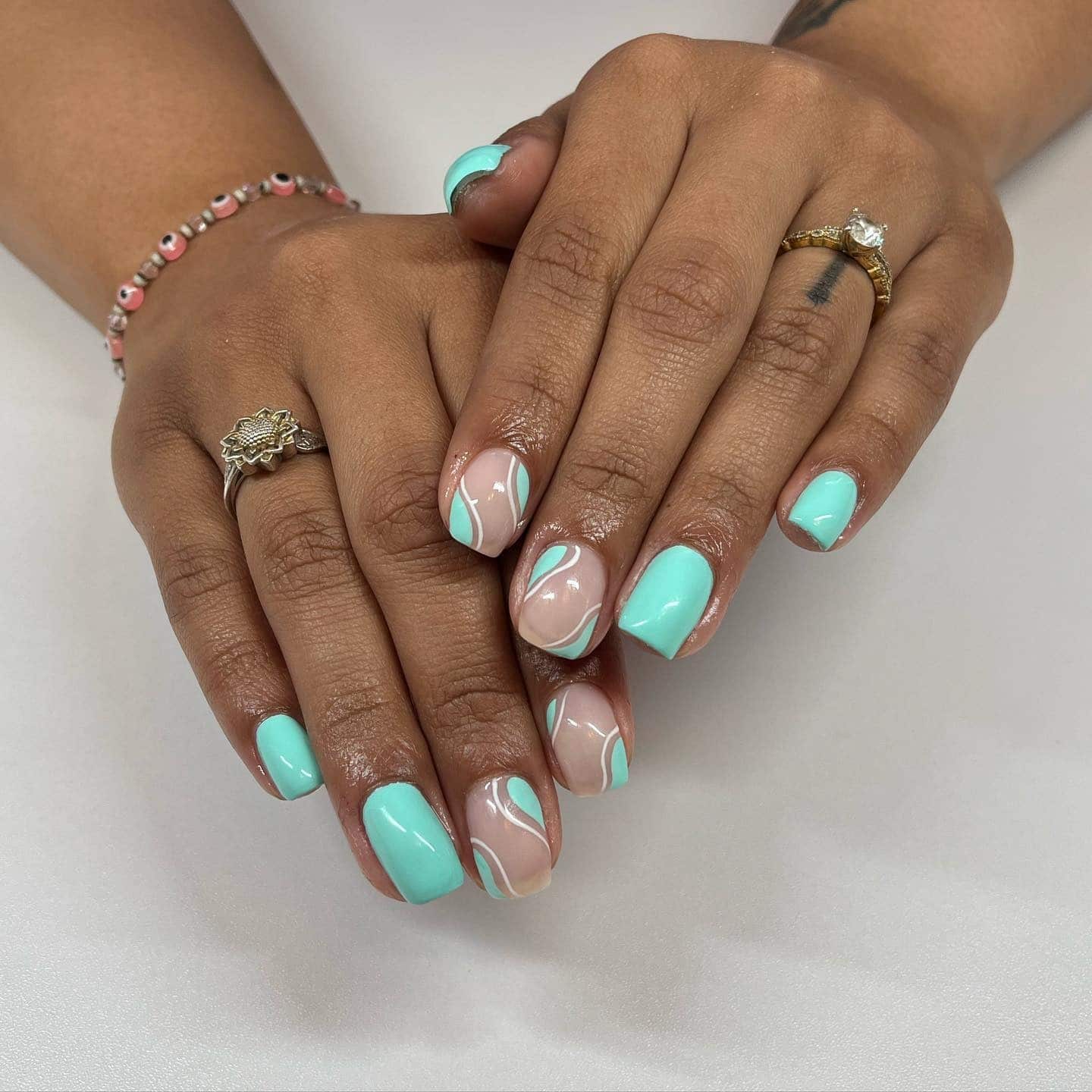6. Abstract Tiffany Blue and Nude Combo - tiffany blue nail ideas