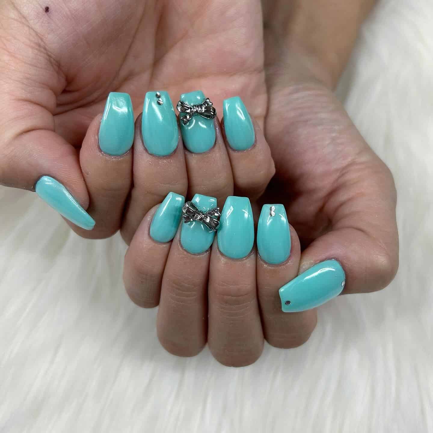 9. 3D Bow Tiffany Blue Nails - tiffany blue nail ideas